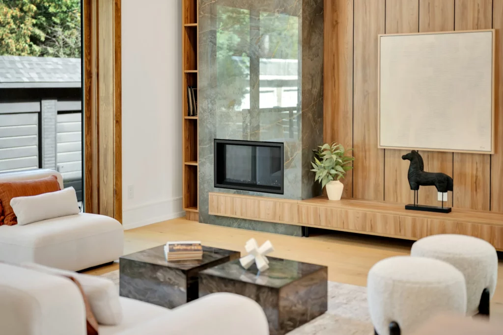 Stone slab fireplace surround with wood panelling