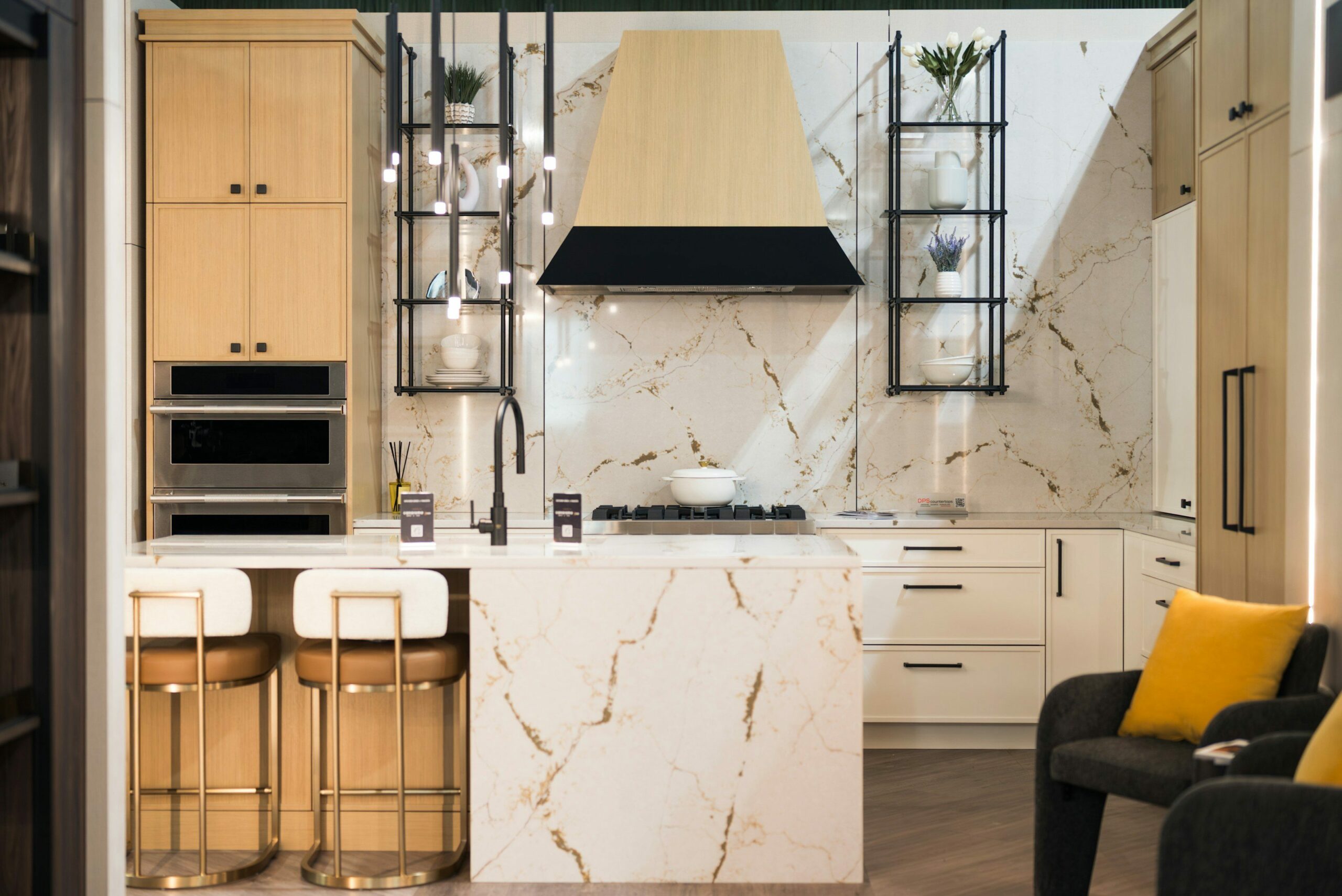 Calacatta waterfall island and slab feature wall