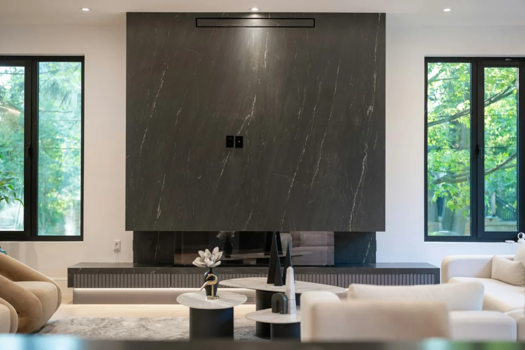 Dark marble slab fireplace wall in a living room