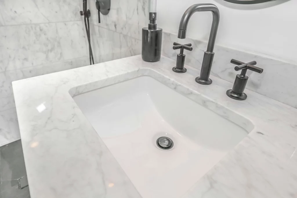 Marble vanity top with an undermount sink