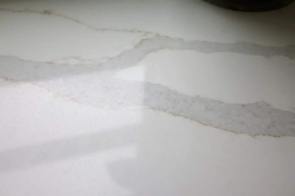 White quartz countertop with soft grey and gold veining