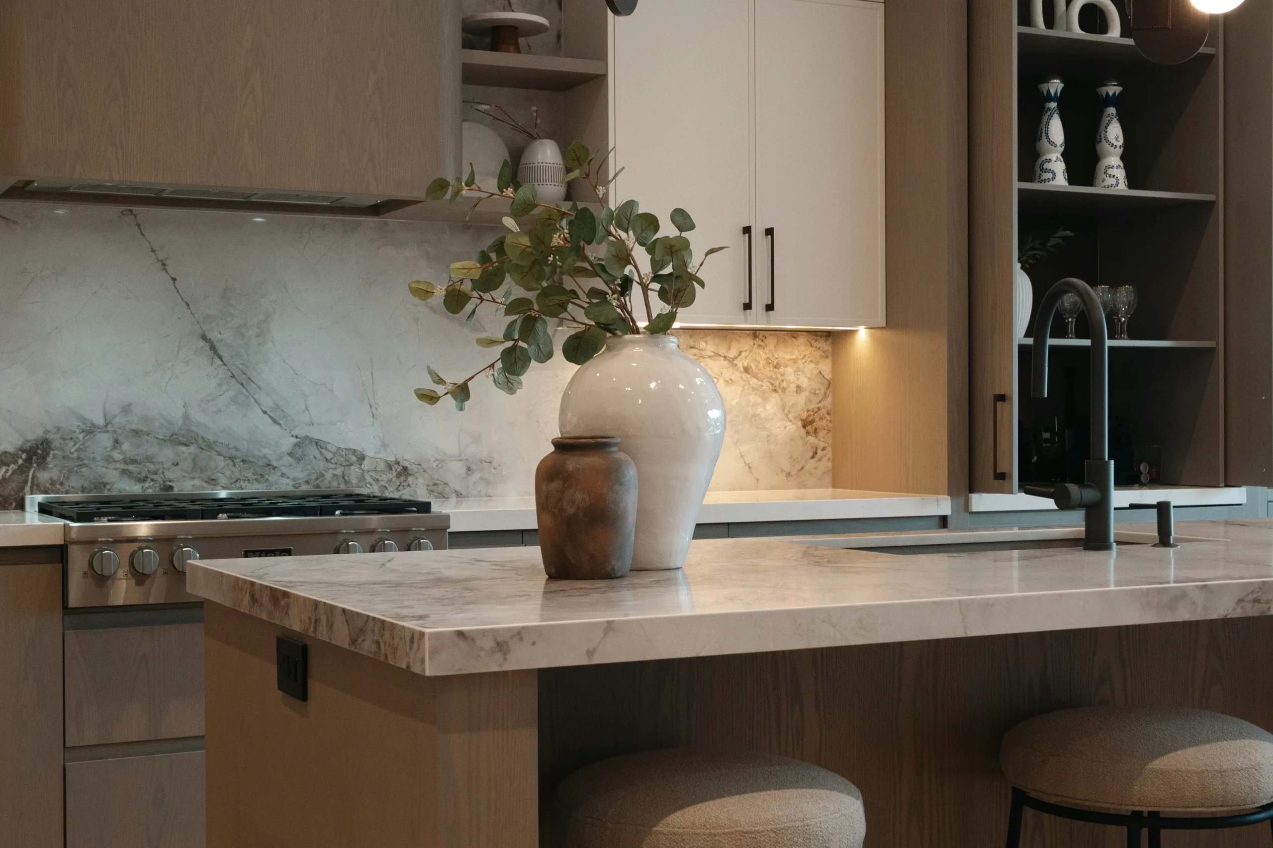 Marble island and full-height slab backsplash